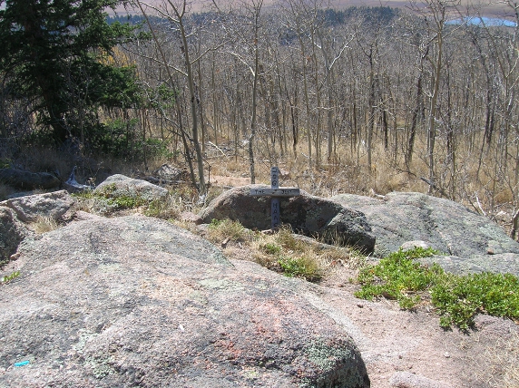 Rocky outcropping with a memorial to a departed pet